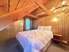 Bedroom #2 with a Queen size bed.