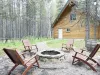 Great back yard to relax in the woods.