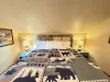Upstairs bedroom with queen bed to comfortably sleep 2 people.