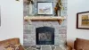 Propane fireplace in the living room, cozy up and read a book on a cool evening.