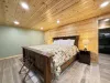 Also located in bedroom #4 is a king size bed.