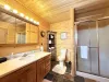 Master bathroom with a spacious countertop and walk in shower