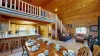 Large open view of dining area, kitchen, and living room.