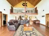 Living room and upper loft. Games are also available in the coffee table.