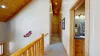 Upstairs hallway with access to the bathroom and bedrooms.
