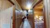 Large hallway to access both bedrooms and the bathroom.