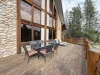 Beautiful outdoor deck with lots of seating to relax and enjoy the scenery.