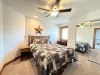 Bedroom #2 located upstairs with a Queen size bed.