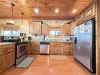 Equipped with dishes, silverware,  pots and pans, and basic cooking essentials.