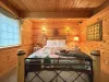 Bedroom #1 located on the main level with a Queen size bed.