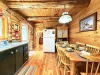 Full size kitchen with appliances, dishes, pots and pans, utensils, and basic cooking essentials.