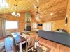 Upon entrance you are greeted by the dining table and living room. Living room also includes a Futon with a Full bed.