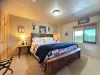 Downstairs bedroom #1 with a King size bed.