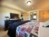 Dresser and closet are included in this room to store your belongings.