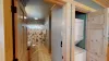 Downstairs bathroom with a laundry closet adjacent. Full size washer and dryer with laundry soap provided.