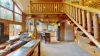 This cabin has a homely feel with a full kitchen that flows into the living and dining area.