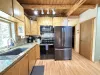 The kitchen lets in lots of natural light.