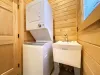 A stacked washer and dryer is also available for your use.