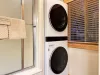 This bathroom also has a stacked washer and dryer for you to use. Laundry soap is also provided.