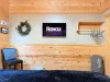 Across from the bed is a flat-screen TV—simple, unobtrusive, ready for late-night movies or quiet mornings.