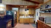 Some appliances included are a blender, coffee maker, waffle iron, and toaster. Along with dishes, silverware, cookware, and utensils.