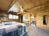 Multiple windows are placed in this room to bring in natural light.