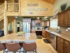 Full kitchen with appliances, cookware, dishes, silverware, and basic spices.