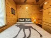 second bedroom with queen and small closet space