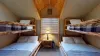 Two sets of bunk beds with 2 twin beds and 2 double beds.