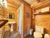 Master bathroom with walk-in shower, toilet, and sink.