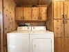 Full size washer and dryer with laundry soap provided.