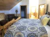 Master bedroom located upstairs with a King size bed and an ensuite bathroom.