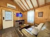 Although this place is small there is still room to cozy up on the couch and watch a movie.
