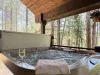 Hot tub is included on the back deck. Hot tub towels are provided.