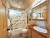 The shower is equipped with a shampoo, conditioner, and body wash for you to use.