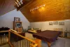 Loft space with seating and tv.
