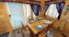 The dining table is perfect to seat up to 6 people with additional seating at the kitchen island.