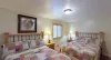 Bedroom #1 located on the main floor with 2 Queen size bed.
