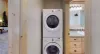 Outside of the bathroom is a stacked washer and dryer for your use. Laundry soap is provided.