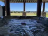 Large hot tub overlooking the beautiful landscape.