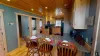 Additional seating is available at the kitchen island with 3 more seats.
