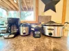 Coffee pot, rice cooker, Belgian waffle maker and crock pot provided for your stay at Timber Heights Cabin.