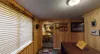 Access to the living room and kitchen are through the door pictured here.