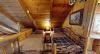 Two twin beds located in the loft.