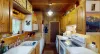 Full kitchen with appliances, dishes, and basic spices.