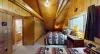The second bedroom upstairs is equipped with one double bed and one twin bed.