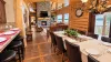 Seating is available at the dining table and the kitchen island for everyone to enjoy their meals.