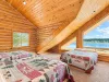 East wing loft is equipped with 3 Queen size bed.