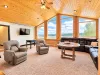 This cabin offers lots of natural lighting to illuminate the bunk room/ game room.