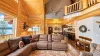 Lots of natural light flows into this room from the large windows.